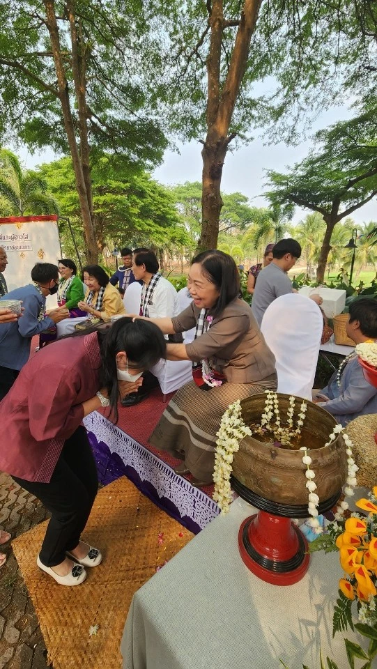 Personnel from the Planning Division Participate in the Water Pouring Ceremony for the President and Elders on the Occasion of the Songkran Festival at Phayao University for the Year 2023